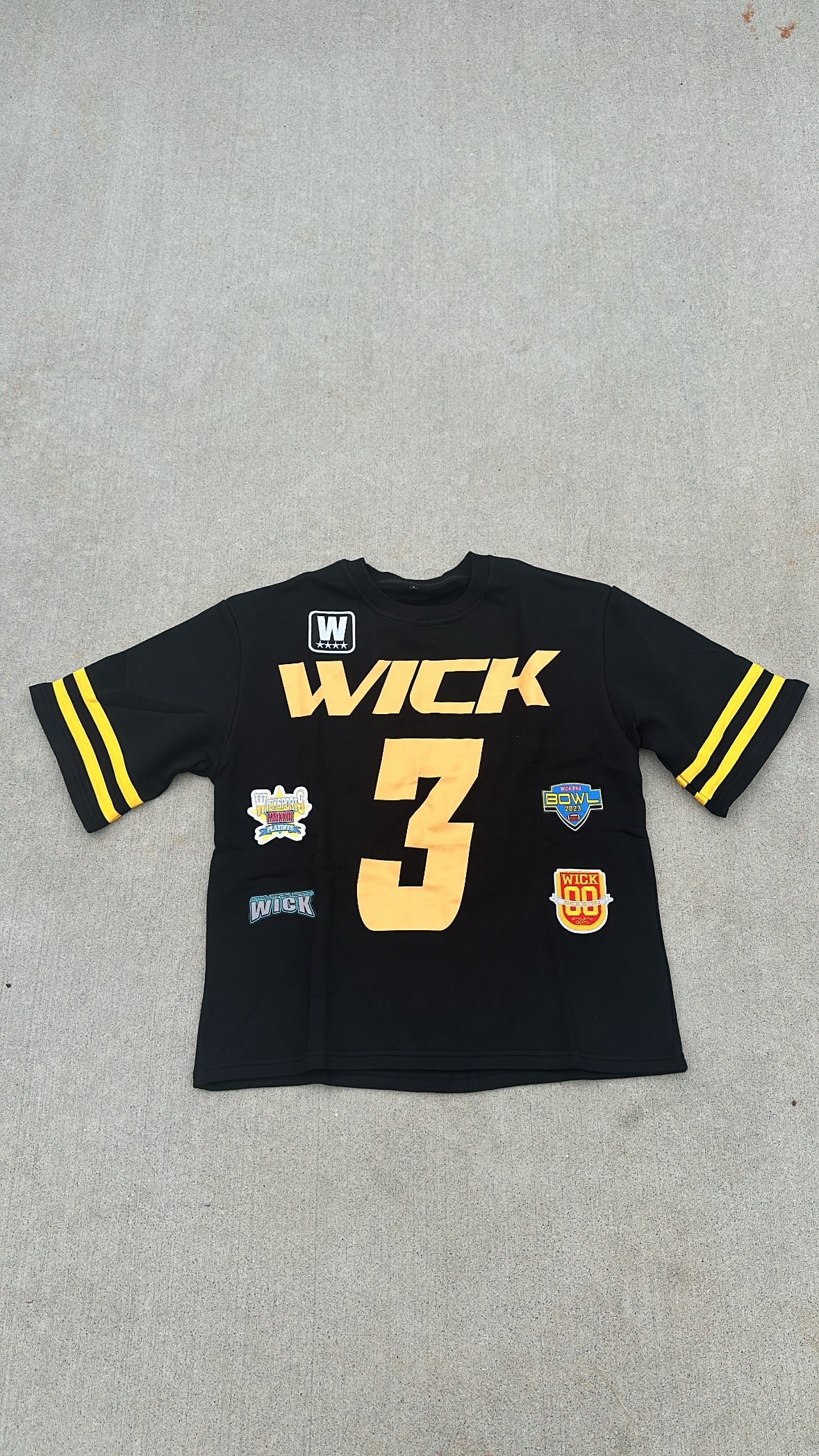 WICK BLACK AND YELLOW JERSEY