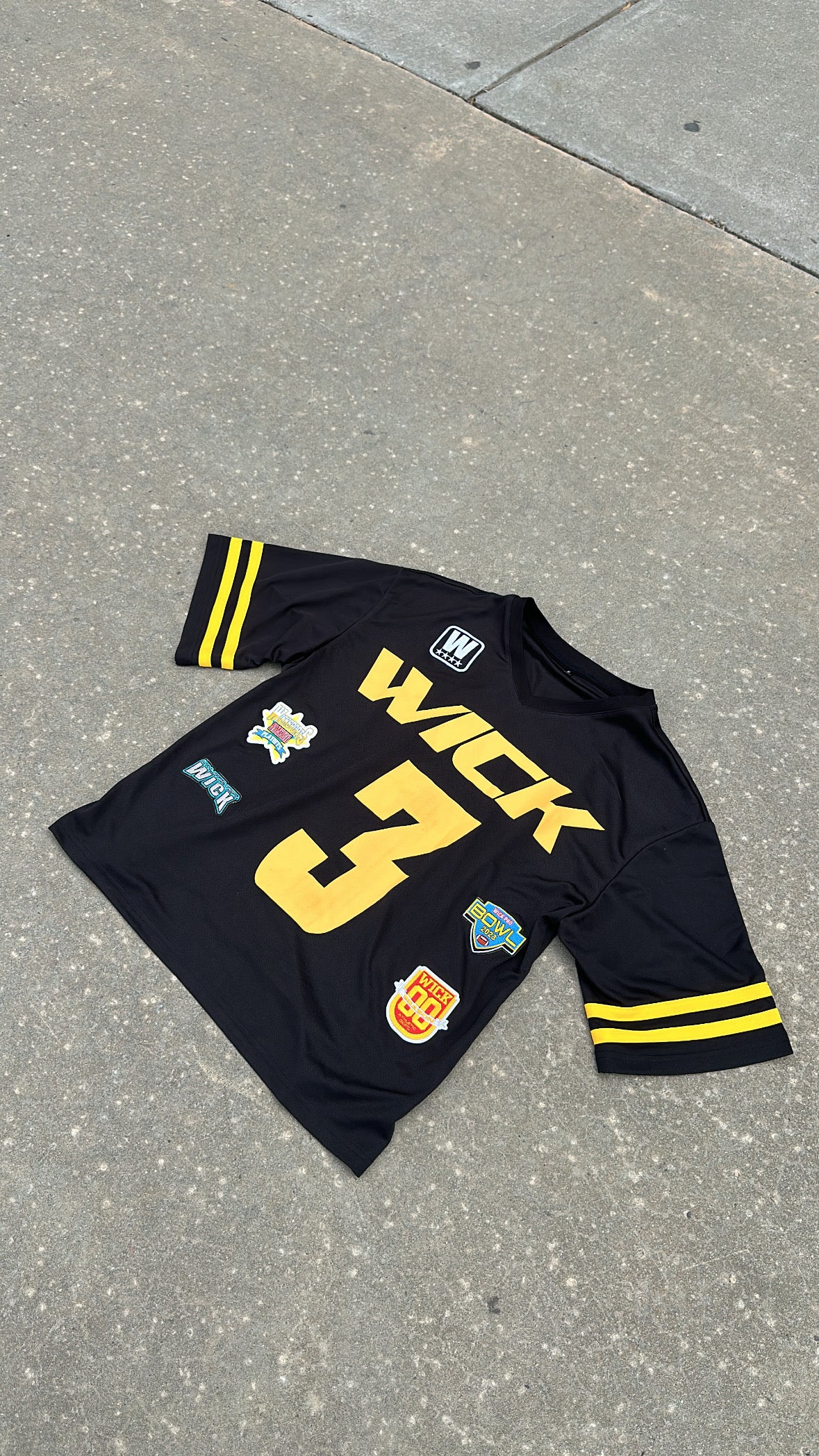 WICK BLACK AND YELLOW JERSEY