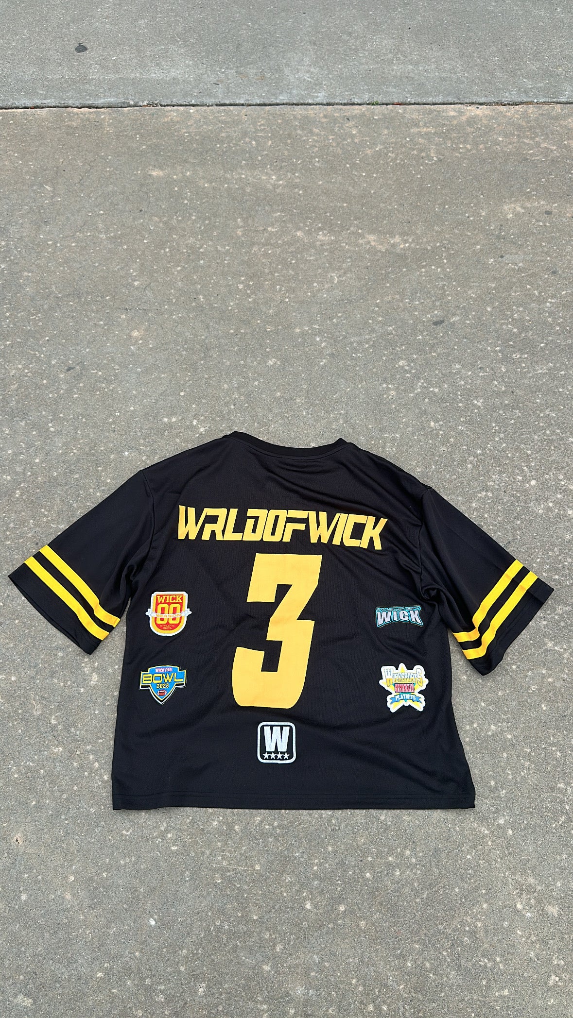 WICK BLACK AND YELLOW JERSEY