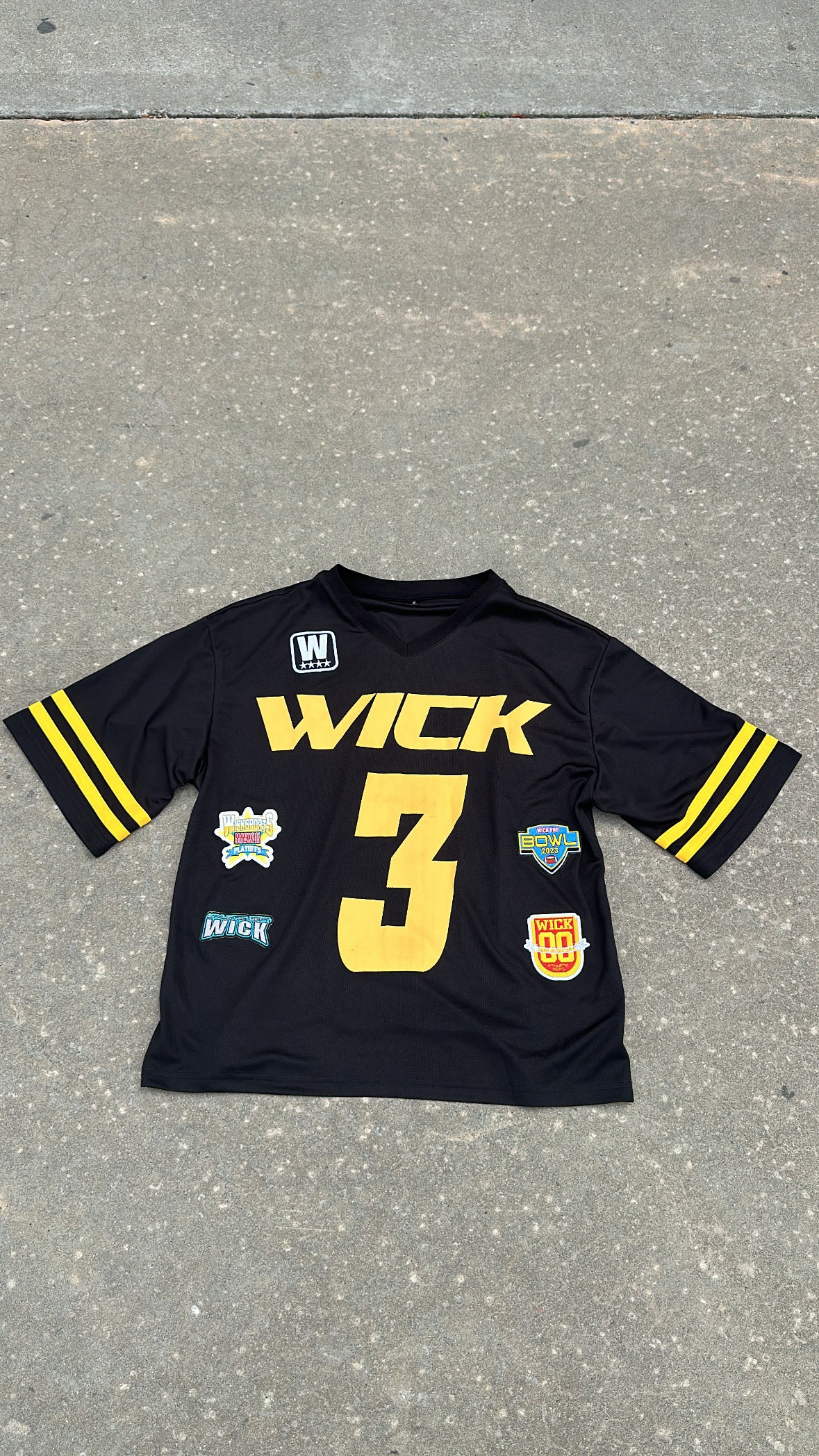 WICK BLACK AND YELLOW JERSEY