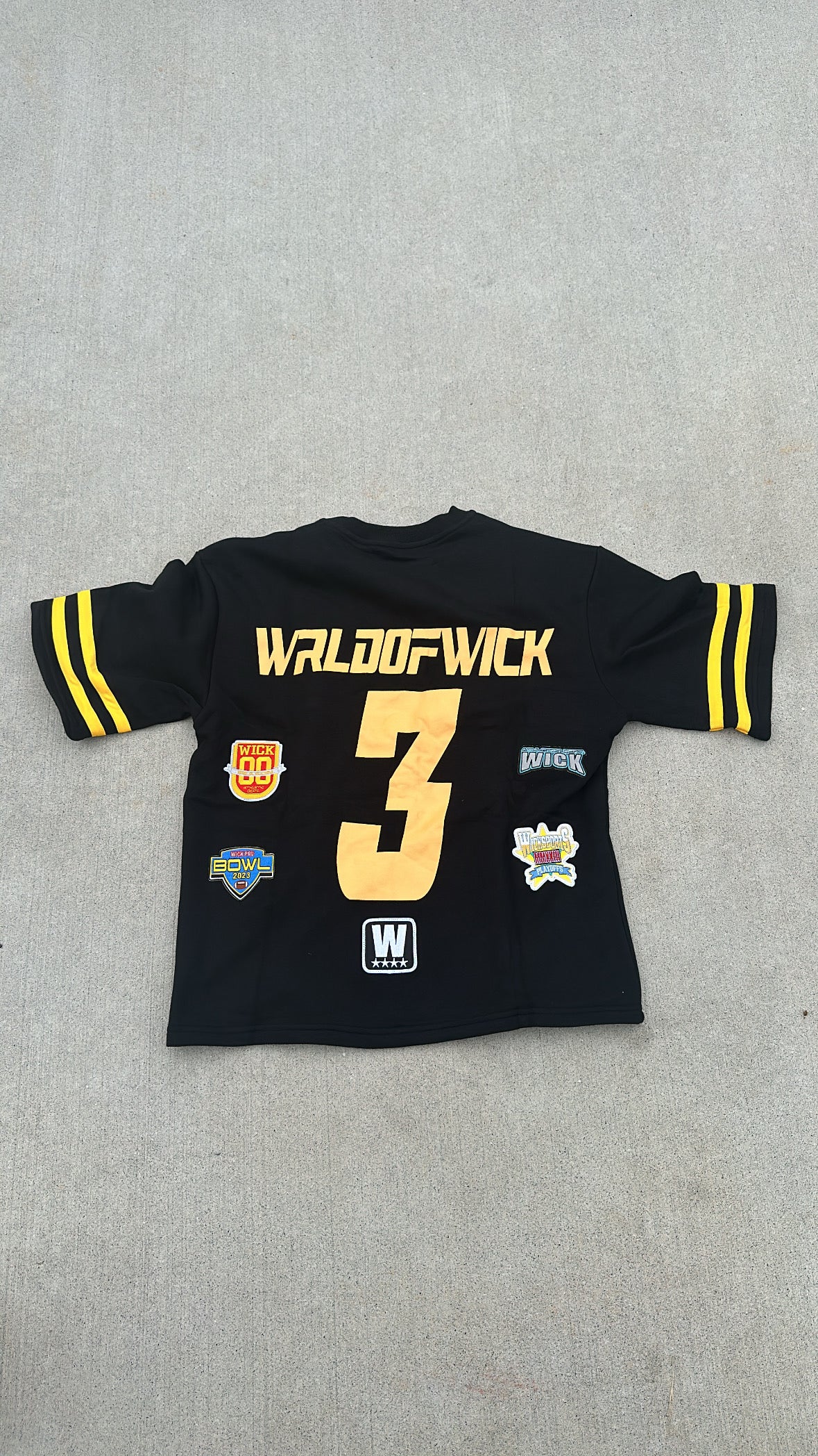 WICK BLACK AND YELLOW JERSEY